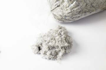 Gekaarde grijze watten ± 5 kilo